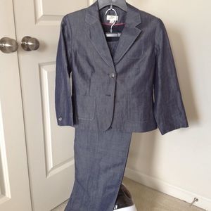Two piece denim suit.